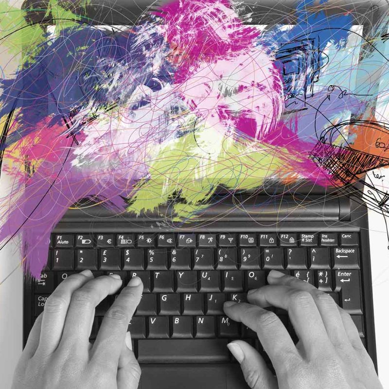 A laptop with artwork over the screen