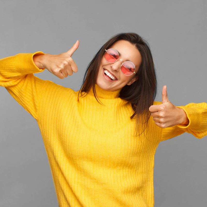A girl with her thumbs up