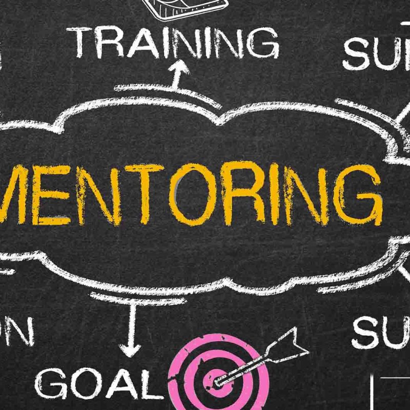 A cloud bubble saying mentoring with ideas coming off of it
